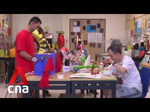 Still from CNA's news report on the Enabling Masterplan 2030 and its aim of helping persons with disabilities live independently.